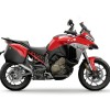 Red adventure motorcycle with saddlebags.