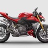 Red Ducati motorcycle on grey background.