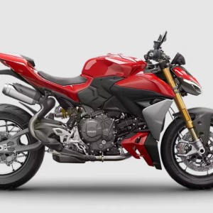 Red Ducati motorcycle on grey background.